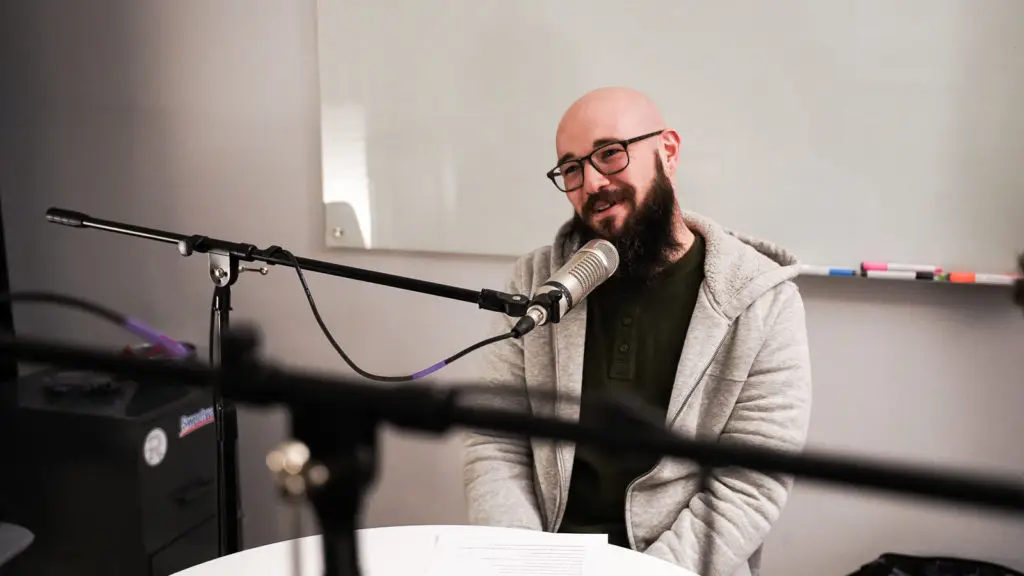 Host recording ads for a sponsor for monetizing a podcast